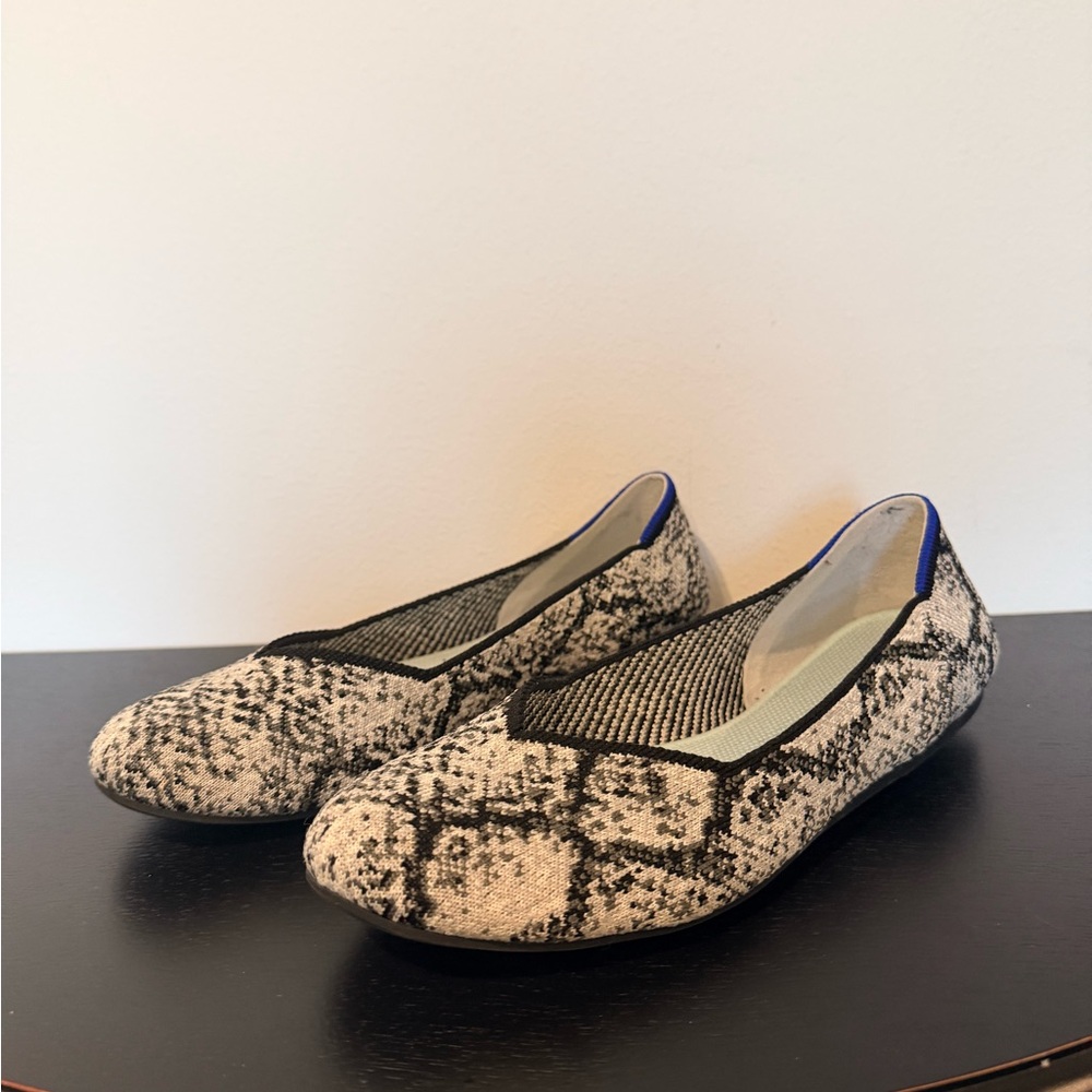 Rothy's Black and Cream Snakeskin Flats